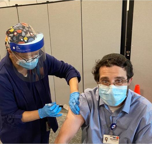 Dr. Markovich got the first dose of the Pfizer COVID-19 vaccine, along with many other doctors.